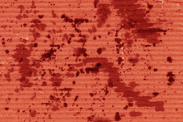 A red vintage rough sheet of carton. Recycled environmentally friendly cardboard paper texture. Simple and bright minimalist papercraft background.
