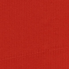A red vintage rough sheet of carton. Recycled environmentally friendly cardboard paper texture. Simple and bright minimalist papercraft background.