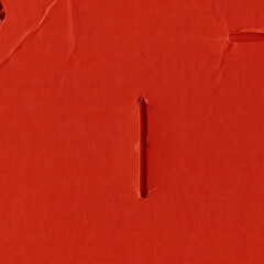 A red vintage rough sheet of carton. Recycled environmentally friendly cardboard paper texture. Simple and bright minimalist papercraft background.