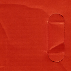 A red vintage rough sheet of carton. Recycled environmentally friendly cardboard paper texture. Simple and bright minimalist papercraft background.