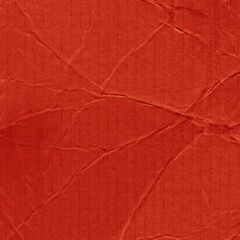 A red vintage rough sheet of carton. Recycled environmentally friendly cardboard paper texture. Simple and bright minimalist papercraft background.