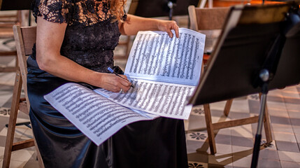 symphony orchestra musicians rehearse before the concert.