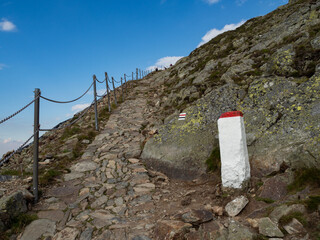 Trail to the top of Sniezka mountain. Border post next to the trail.