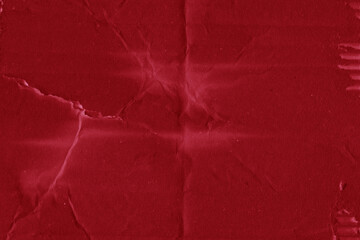 A red vintage rough sheet of carton. Recycled environmentally friendly cardboard paper texture. Simple and bright minimalist papercraft background.