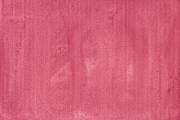 A red vintage rough sheet of carton. Recycled environmentally friendly cardboard paper texture. Simple and bright minimalist papercraft background.