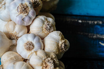 garlic bunch on a blue wooden table