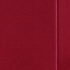 A red vintage rough sheet of carton. Recycled environmentally friendly cardboard paper texture. Simple and bright minimalist papercraft background.
