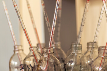 experiment water in beaker and flask in chemistry science laboratory background, medical concept