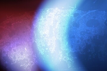 Blue and blue burgundy background with bright luminous motif in the middle part © Adam Bialek