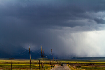 Kyrgyzstan, Pamir tract, local road to the mountains before a thunderstorm
