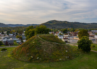Aerial drone shot of the ancient historic native American burial mound in Moundsville, WV