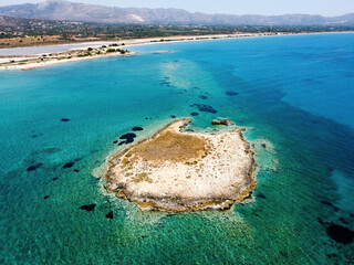 Aerial panoramic view of Pavlopetri islet near Pounda exotic beach in Lakonia