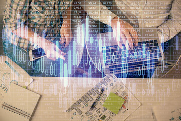 Multi exposure of man and woman working together and forex graph hologram drawing. Financial analysis concept. Computer background. Top View.