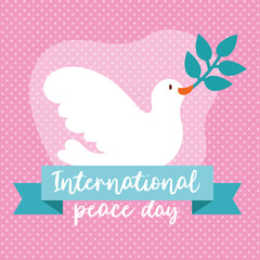 International Day of Peace lettering with dove and olive branch