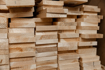 stack of coniferous boards lying on the base