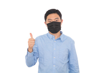 Man wearing a mask makes thumbing out gesture in front of white background