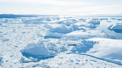 Drone photo of Iceberg and ice from glacier in arctic nature landscape on Greenland. Aerial photo drone photo of icebergs in Ilulissat icefjord. Affected by climate change and global warming. © Maridav
