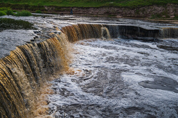 Waterfall, water flowing from the river falls down