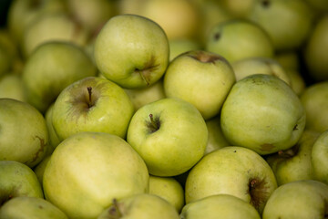 Apples on display at a farmers market