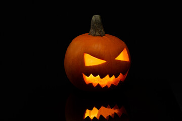Jack o Lantern on a black background.