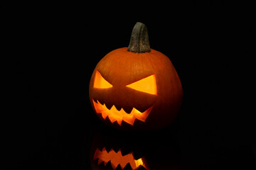 Jack o Lantern on a black background.