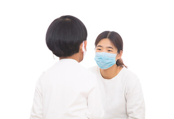 Daughter and mother wearing masks during coronavirus pneumonia