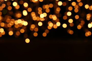 bokeh colorful golden yellow background on black background