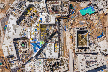 Fototapeta premium foundations for large commercial building. aerial top view of concrete slab floor