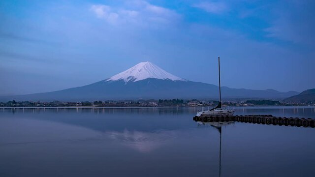 Sunrise of Mt Fuji at Lake Kawaguchiko and boat at a pier