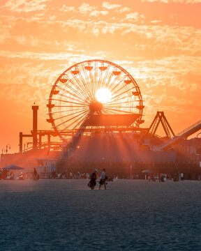 Sun Sets Behind The Santa Monica Ferris Wheel.