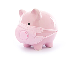 Piggy bank wearing a mask on white background