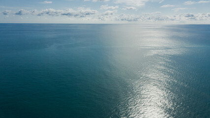 blue sky. horizon above a surface of the sea. azure wavy surface of seawater. absolute freedom. Aerial view 