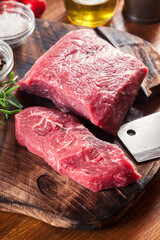 Raw beef steak on a cutting board