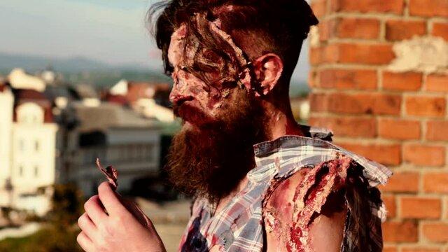 Portrait of a creepy scary zombie. Halloween. Horror film.
