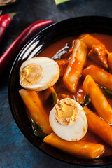 Spicy tteokbokki, korean rice cake with boiled egg