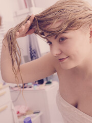 Naklejka premium Woman with wet blonde hair