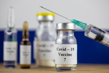 Greece Flag and bottle with vaccine and syringe, Coronavirus, Covid-19, Medicine, science and healthcare concept