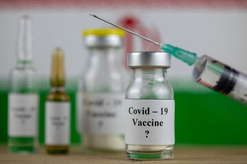 Iran Flag and bottle with vaccine and syringe, Coronavirus, Covid-19, Medicine, science and healthcare concept