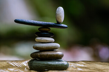 Balanced Zen stones at the waterfalls