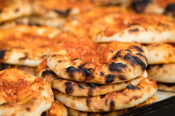 Traditional Iraqi pitas coated with olive oil and paprika in the Mahane Yehuda market in Jerusalem