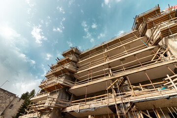 Building in the middle of a government plan to expand and strengthen the building against earthquakes, Jerusalem, Israel.
