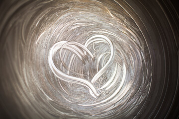 Heart Image in Greasy Bowl of Butter