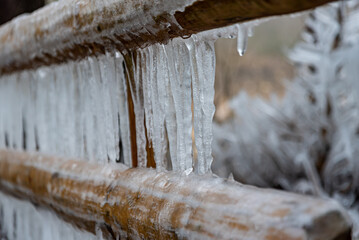 Ice covered on wood in winter. 