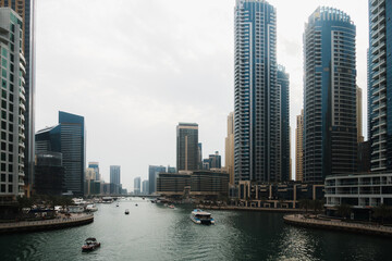 Fototapeta na wymiar Dubai marina skyscrapers and man made lake