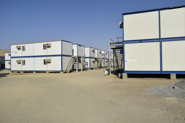 Portacabin, porta cabin, temporary labors camp , Mobile building in industrial site or office container Portable house and office cabins. Labor Camp. Porta cabin. small temporary houses
