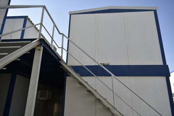 Portacabin, porta cabin, temporary labors camp , Mobile building in industrial site or office container Portable house and office cabins. Labor Camp. Porta cabin. small temporary houses