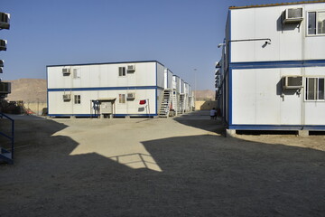Portacabin, porta cabin, temporary labors camp , Mobile building in industrial site or office container Portable house and office cabins. Labor Camp. Porta cabin. small temporary houses