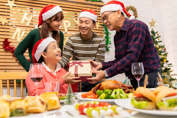 Thanksgiving or christmas Celebration Asian  Family Dinner Concept.Asian happy family celebrating...