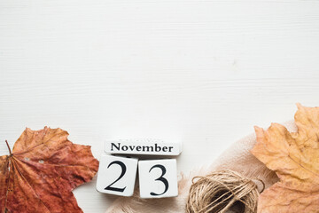 twenty third day of autumn month calendar November with copy space