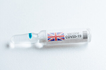 United Kingdom of Great Britain and Northern Ireland developments of a coronavirus covid-19 vaccine in a glass ampoule